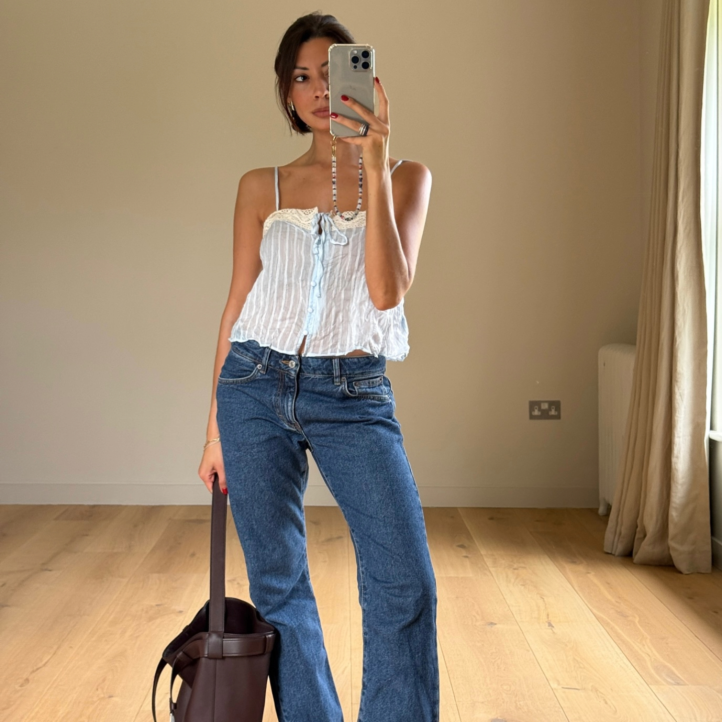 Marianne Smyth in a blue striped top and Jeanerica jeans