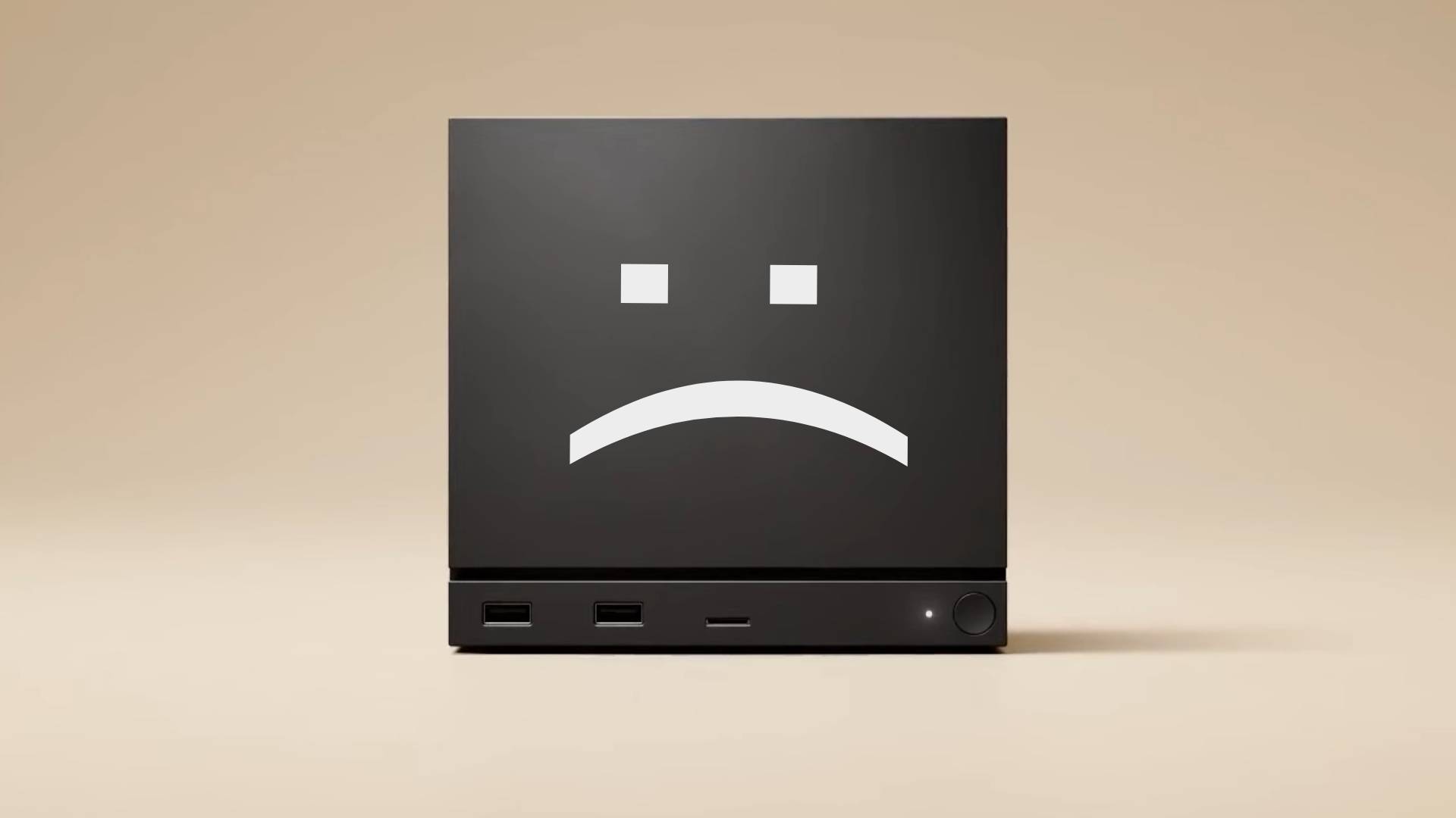 Steam Machine with beige backdrop and sad face on front made from closed bracket and colon.