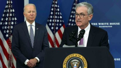Federal Reserve Board Chair Jerome Powell speaks as President Joe Biden listens during an Nov. 22 announcement at the South Court Auditorium of Eisenhower Executive Office Building in Washington, D.C.