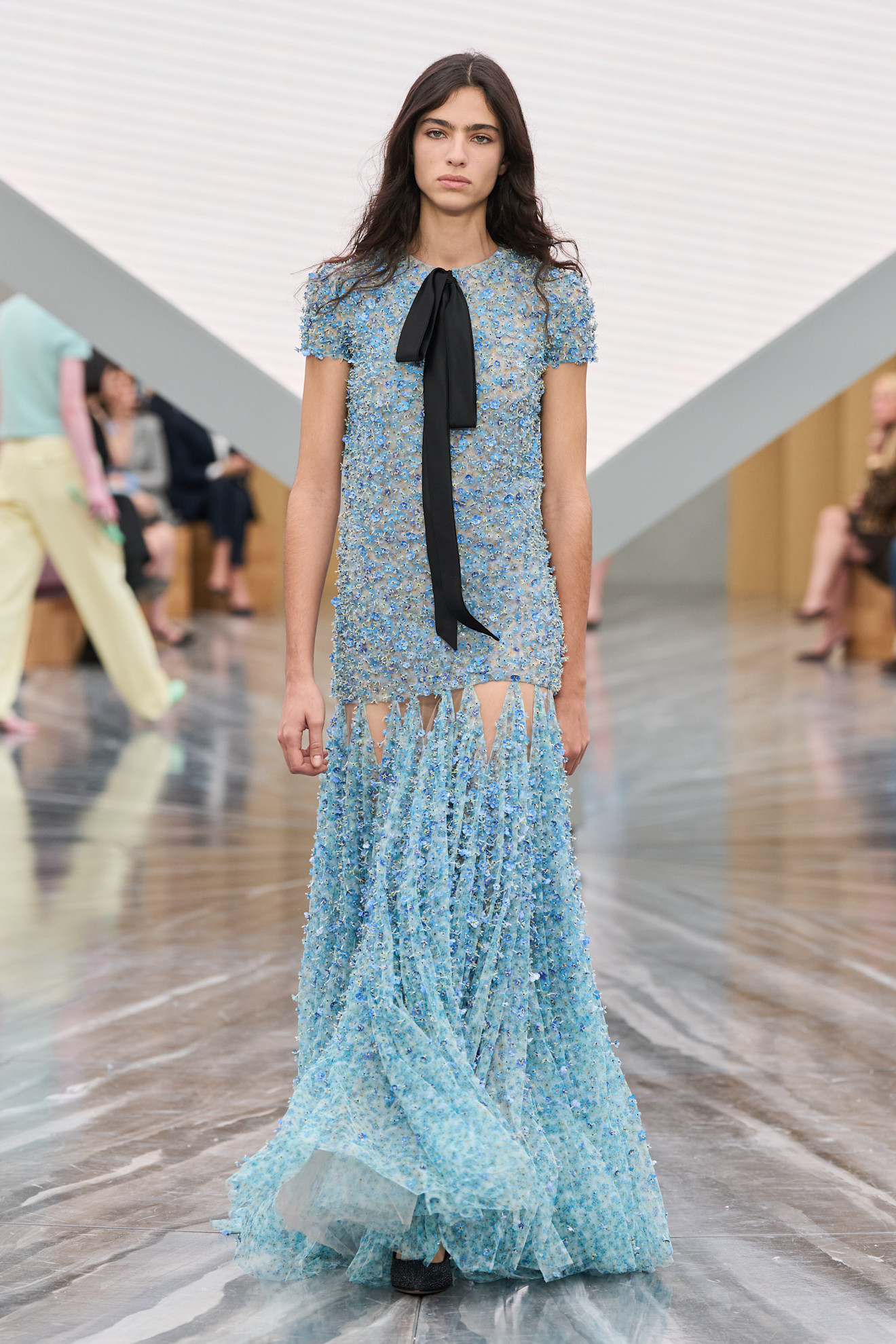 A model wore a Dior Spring 2026 dress in the same floral fabric as Natalie Portman