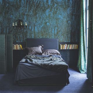 bedroom with palm pattern and crocodile style lower wall
