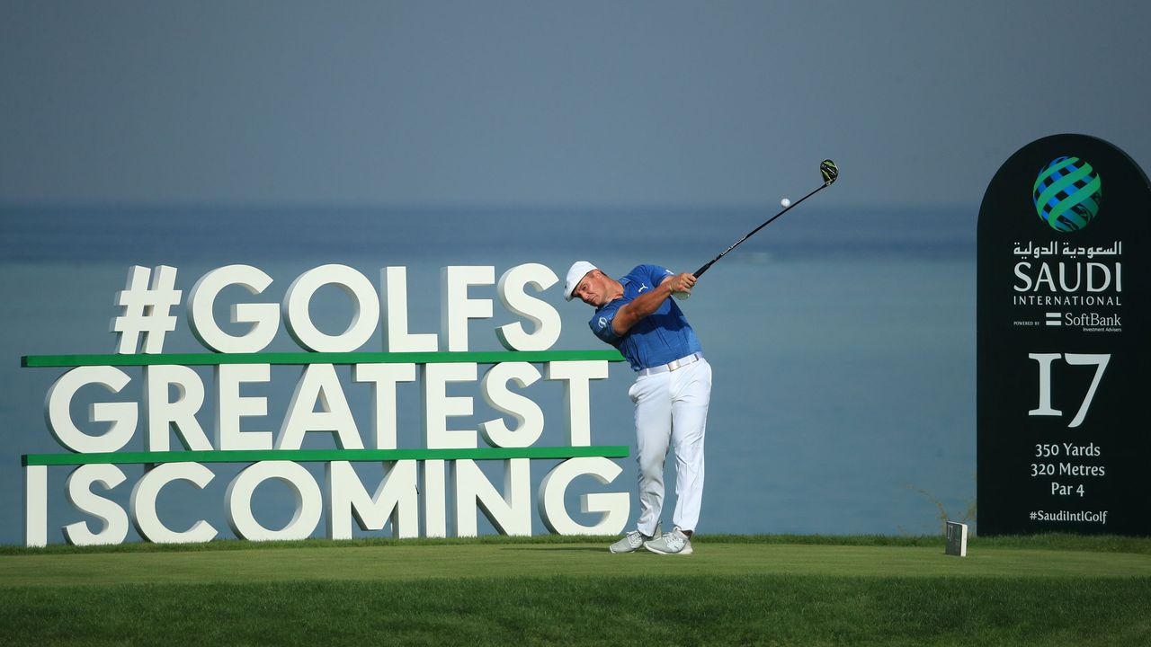 Bryson DeChambeau hits a shot