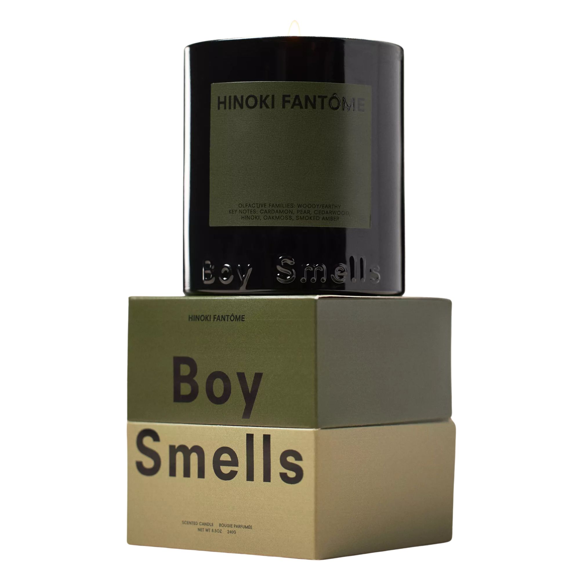 Boy smells Hinoki candle