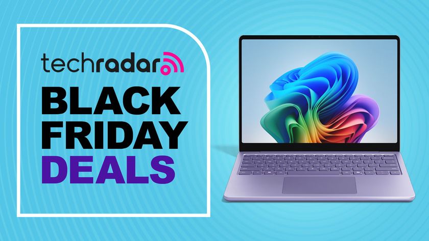A violet Microsoft Surface Laptop 13-inch (2025) against a TechRadar Black Friday deals background