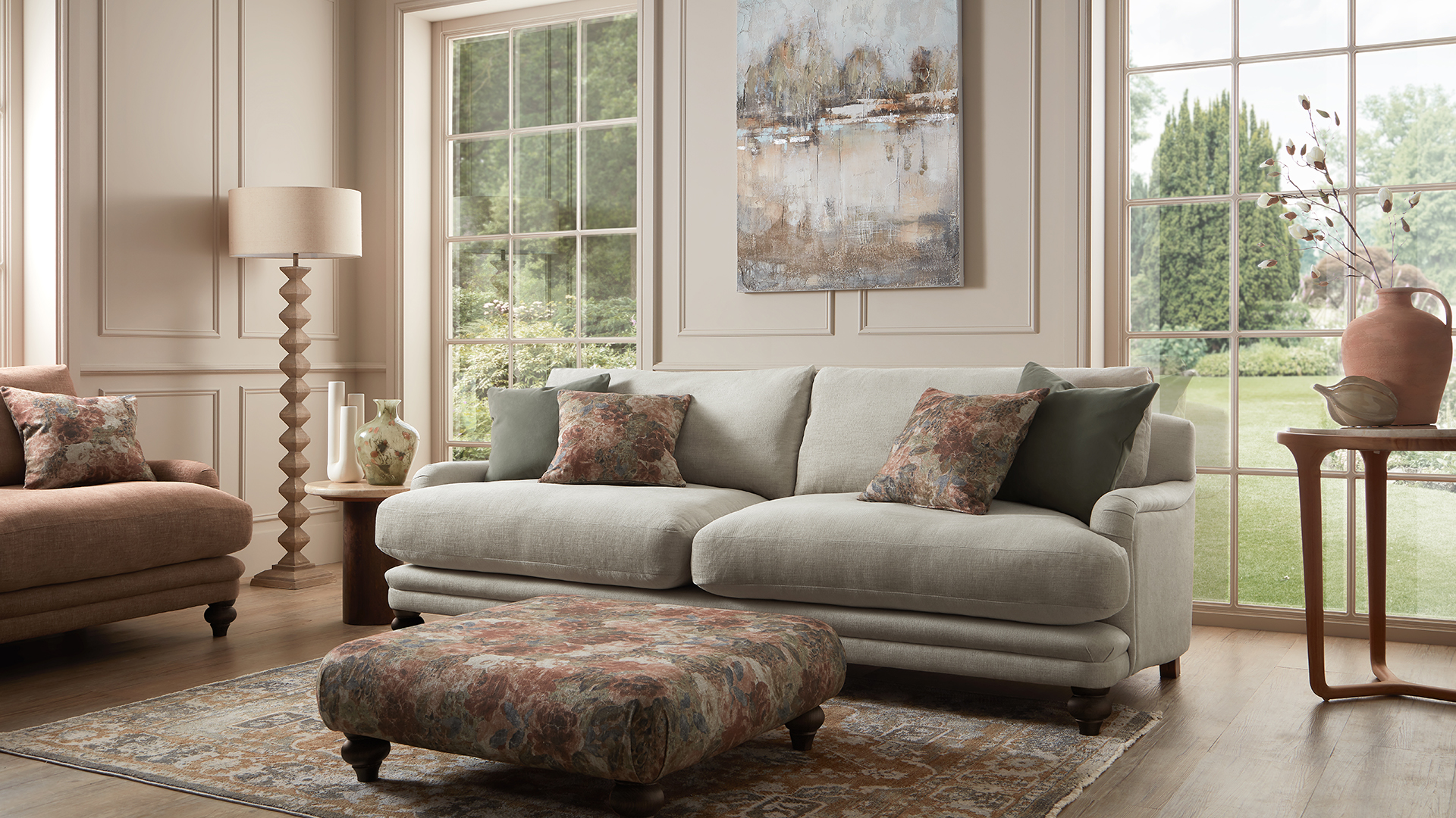 Floral rug, cushions and ottoman