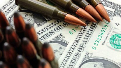 Bullets over dollar bills