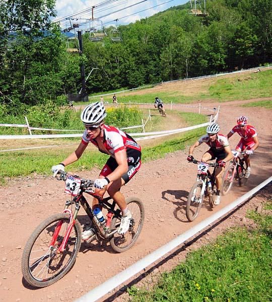Max Plaxton, Sid Taberlay and Todd Wells in an uphill breakaway
