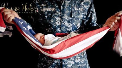 Baby in the flag.