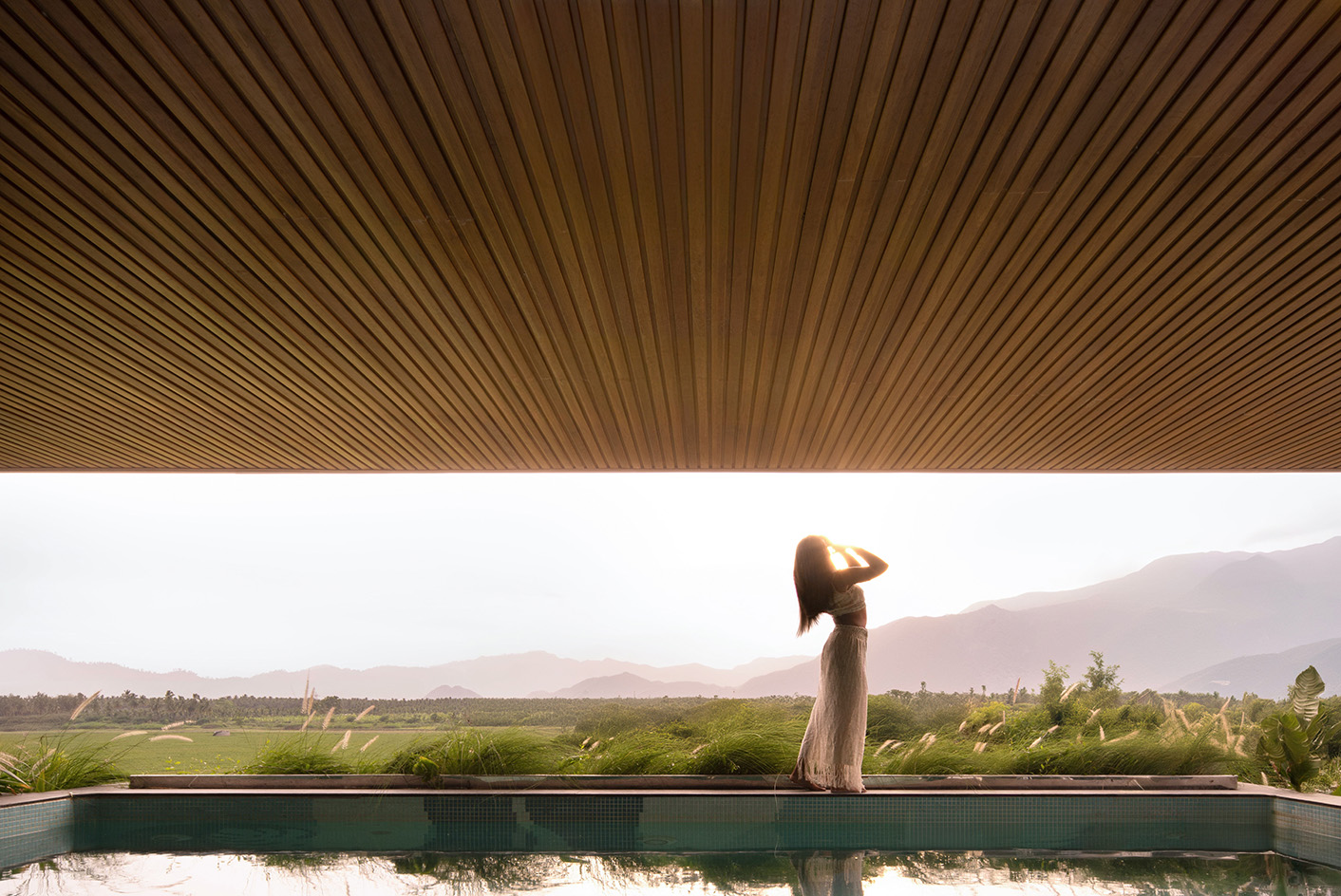 Western Valley House pool with woman