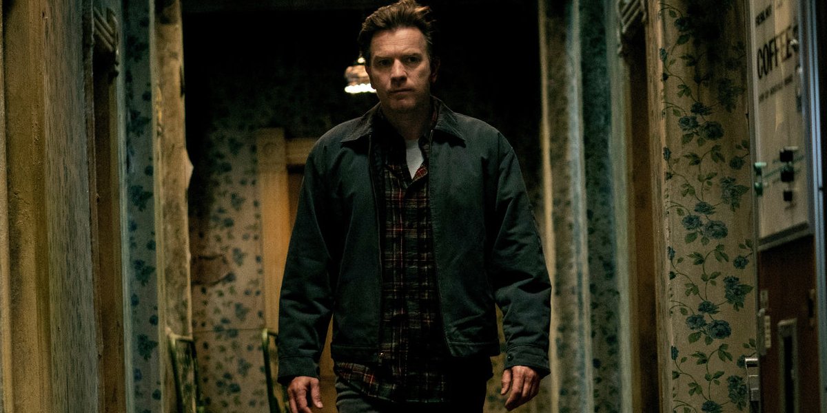 Doctor Sleep Ewan McGregor walking down a hallway of The Overlook Hotel