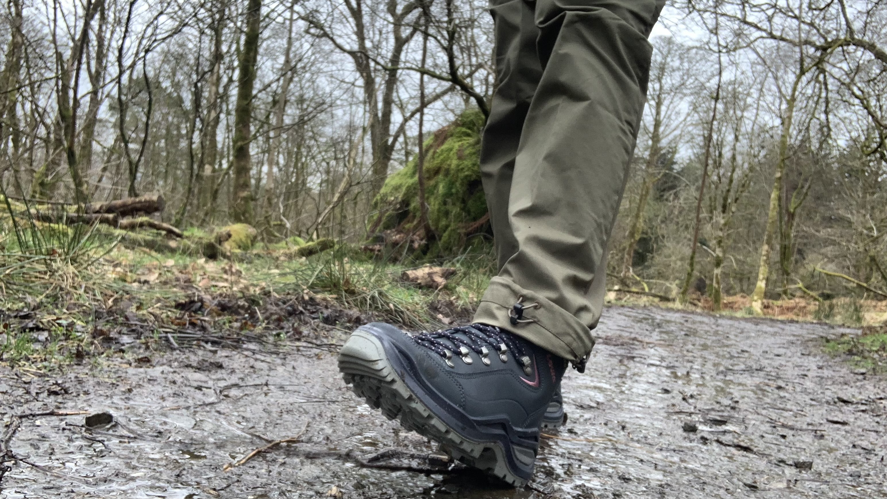 A hiker&#039;s foot wearing the Lowa Renegade EVO boots