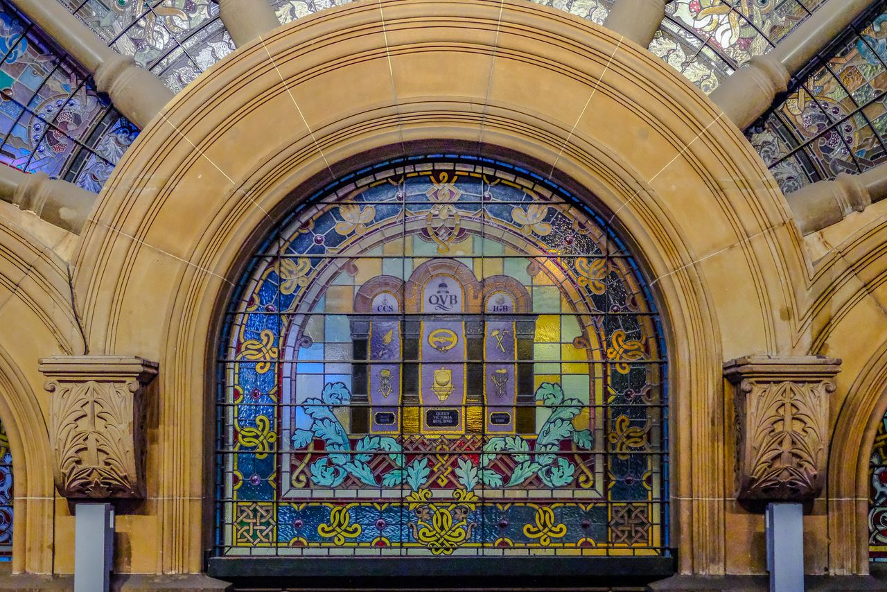 A stained-glass window inside a building