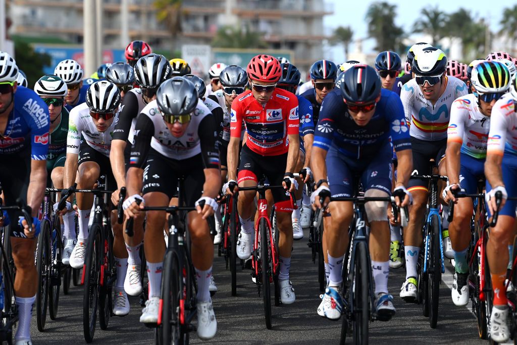 OLIVA SPAIN SEPTEMBER 01 LR Juan Ayuso of Spain and UAE Team Emirates White Best Young Rider Jersey Lenny Martinez of France and Team Groupama FDJ Red Leader Jersey and Oier Lazkano Lopez of Spain and Movistar Team compete during the 78th Tour of Spain 2023 Stage 7 a 2008km stage from Utiel to Oliva UCIWT on September 01 2023 in Oliva Spain Photo by Tim de WaeleGetty Images