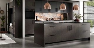 dark wood kitchen with black countertops and brown and metallic marble splashback to show darker toned kitchen trends 2023