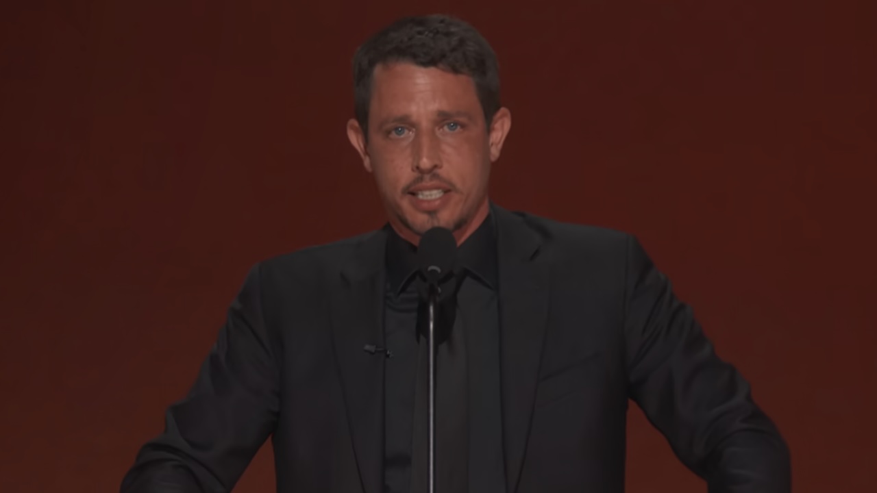 Tony HInchcliffe behind microphone at Netflix's Roast of Kevin Hart