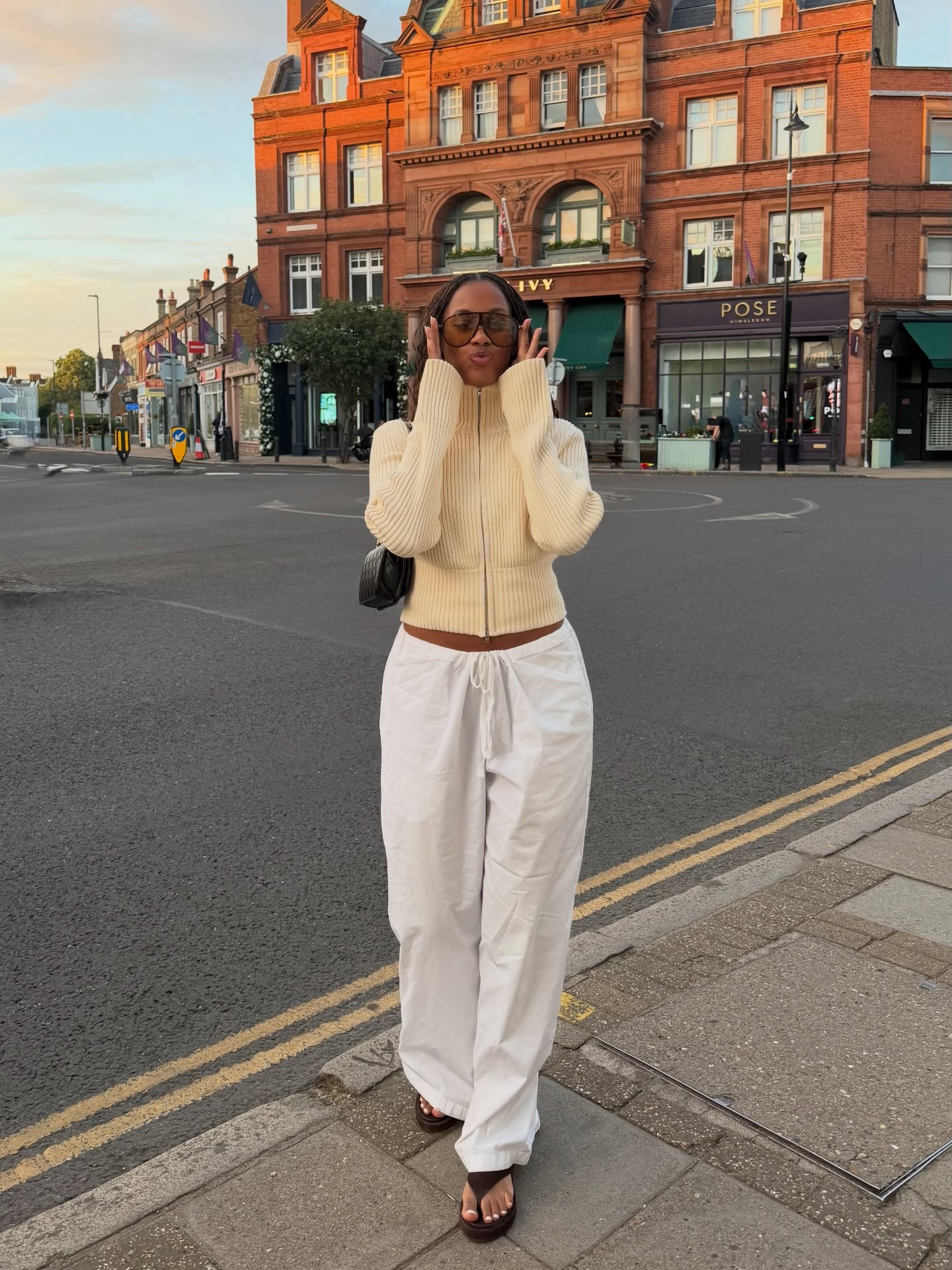 A woman wearing the thick-thong-sandal trend.