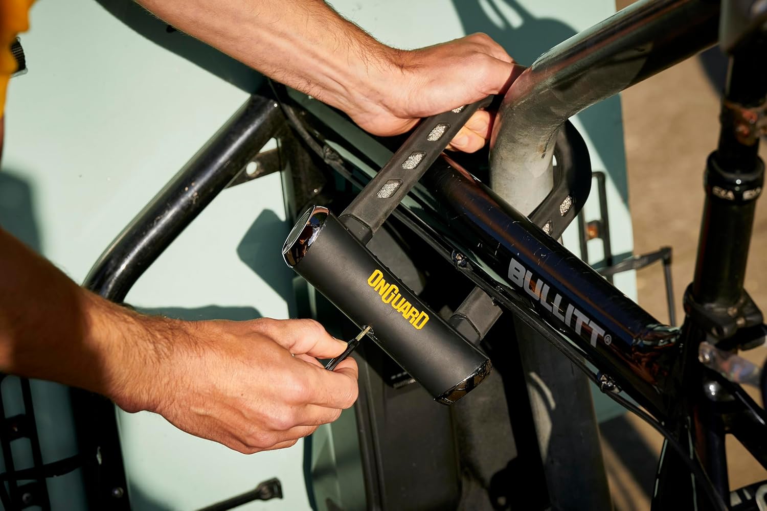 The OnGuard RockSolid U-Lock being attached to a bike