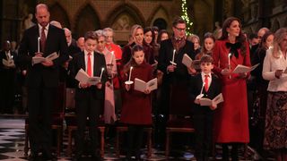 Prince William, Prince of Wales, Prince George, Princess Charlotte, Prince Louis and Catherine, Princess of Wales during the 'Together At Christmas' Carol Service at Westminster Abbey on December 6, 2024