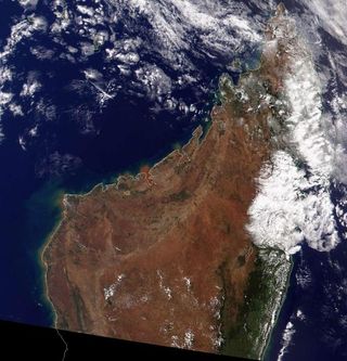 Once almost entirely covered in green, lush vegetation, Madagascar has witnessed the destruction of an estimated 80 percent of its indigenous forests. The now reddish-brown terrain can be seen in this true-color image of northern Madagascar acquired on May 24, 2000, by NASA's Terra satellite.