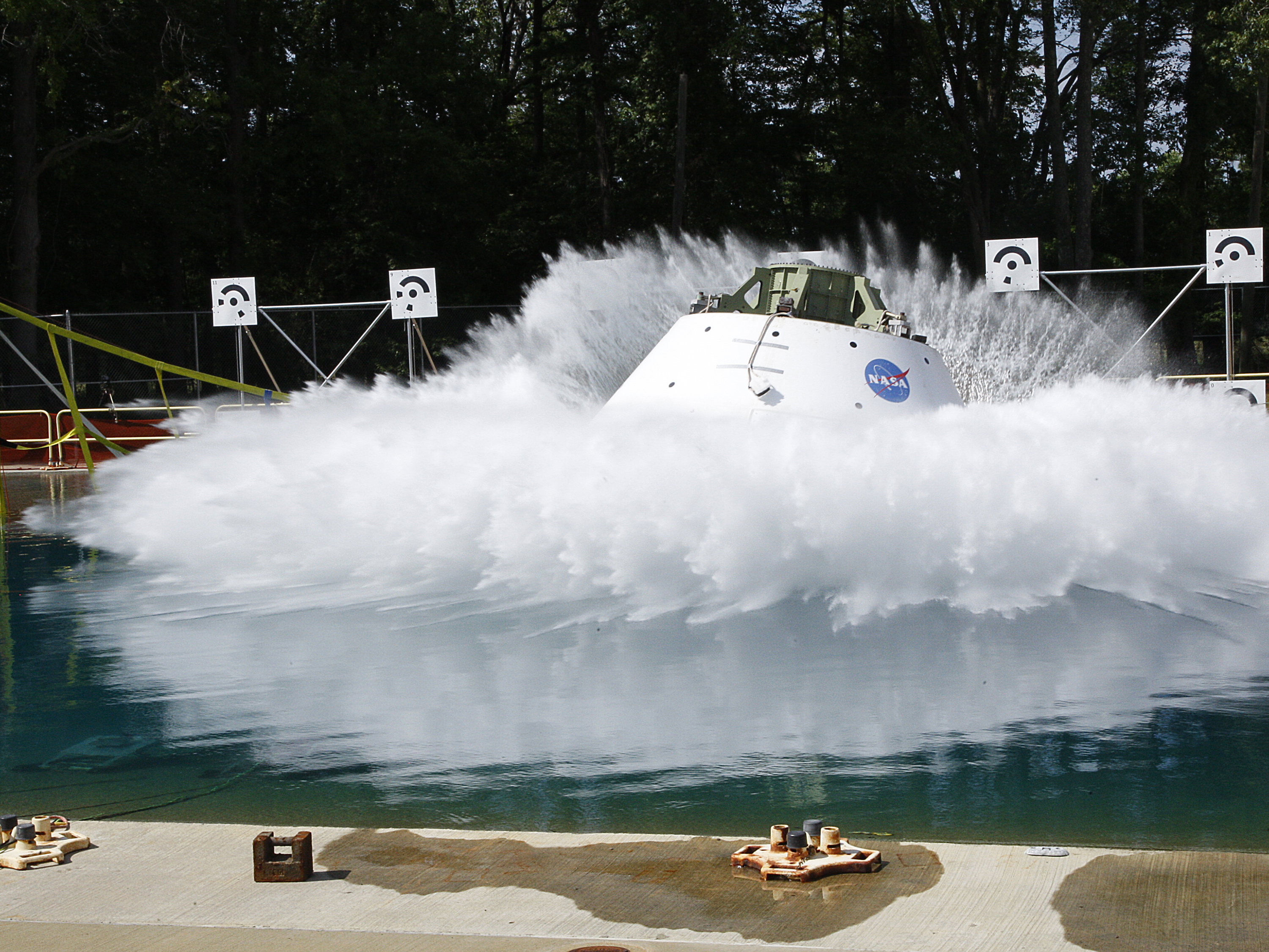 orion splashing down in a pool