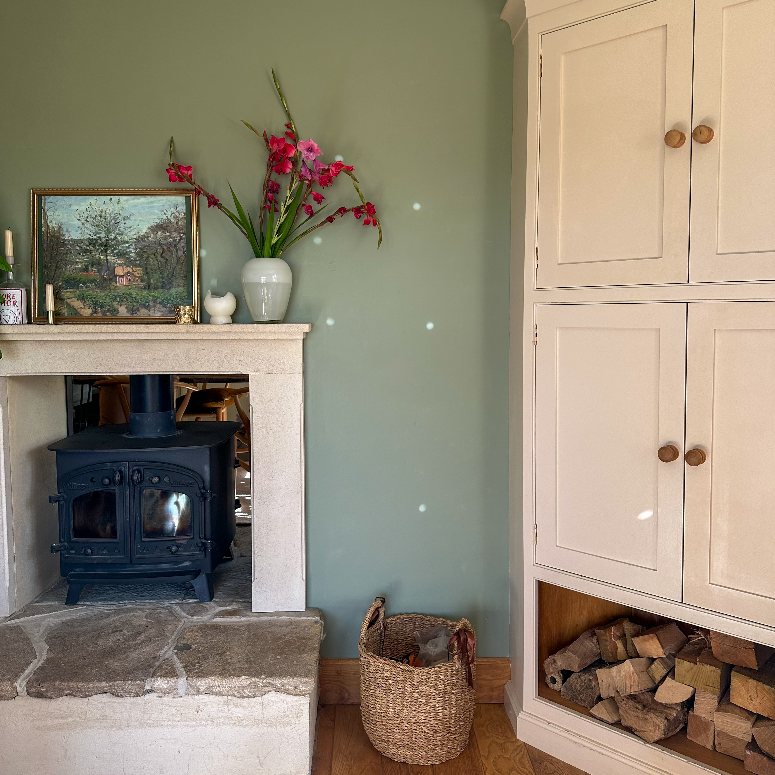 fireplace with green walls