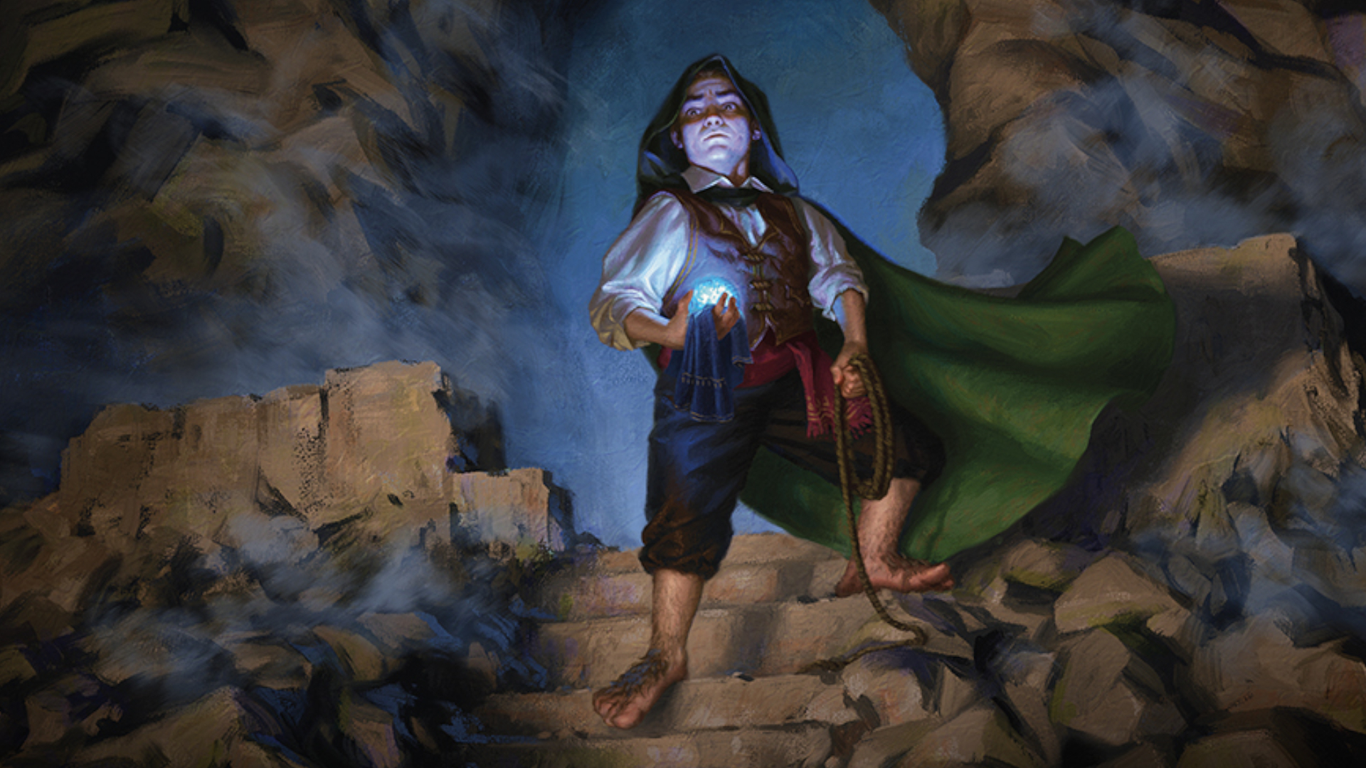Bilbo Baggins holds the Arkenstone on stony steps with his hood up, clutching rope in his other hand