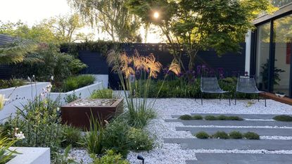 modern gravel garden with ornamental grasses