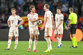 Bayern Munich's players looks frustrated following the full-time whistle on Wednesday