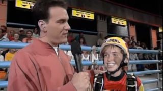 A contestant and a host on Nickelodeon Guts