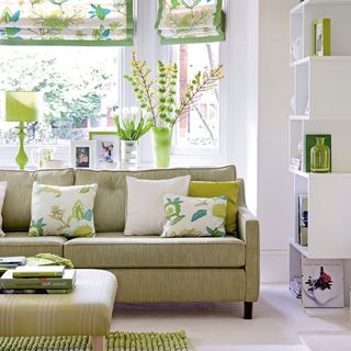 living room with sofa and flower vase