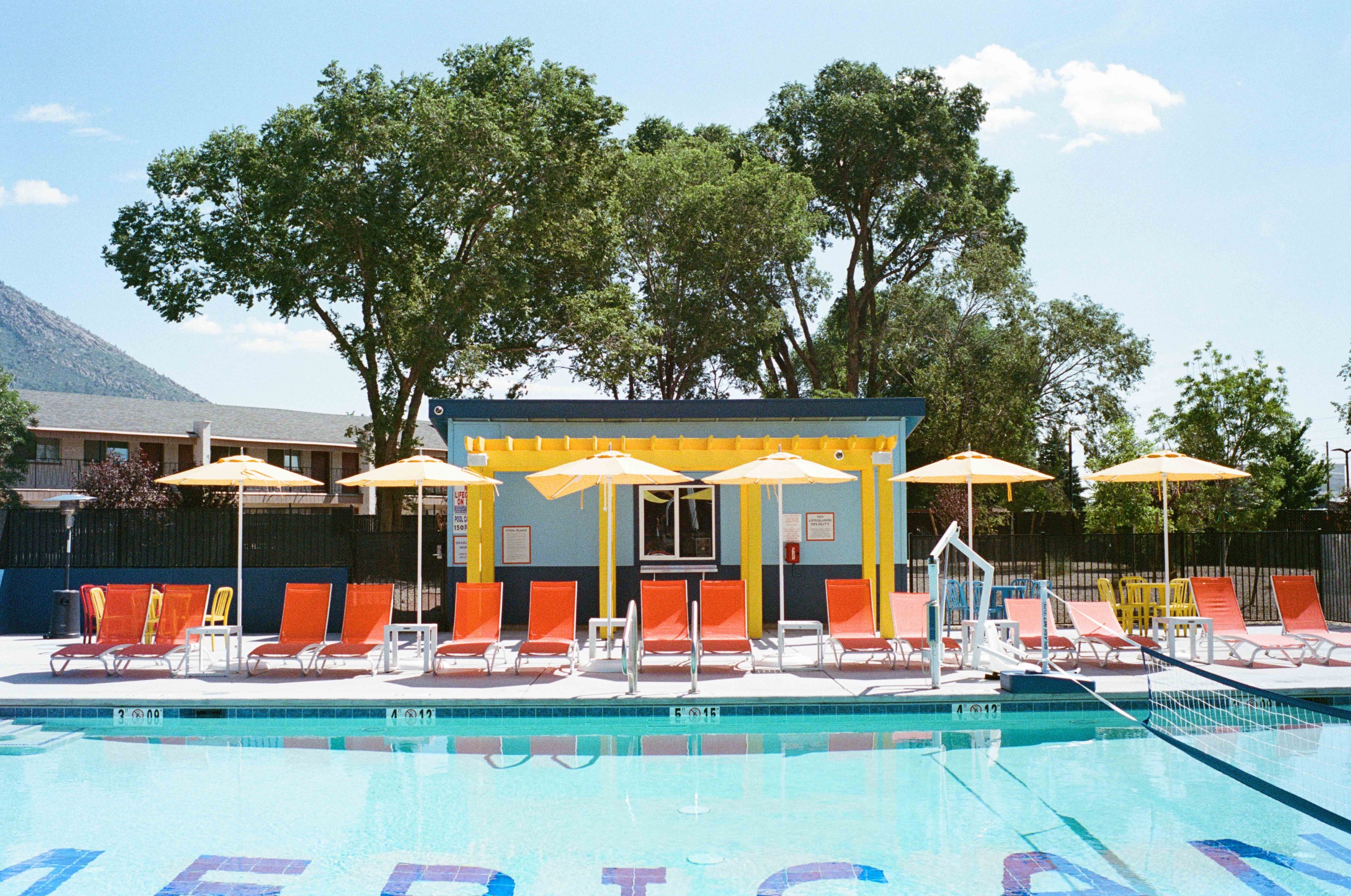 Retro-style photographs of the Route 66 road, motels and vintage vehicles