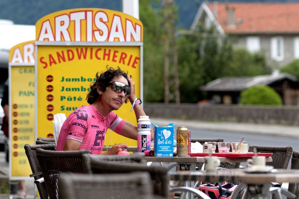 Australian cyclist Lachlan Morton takes a break during the 13th day of his solo alternative Tour de France cycling race in TarasconsurAriege on July 8 2021 Lachlan Morton is riding every kilometer of the Tour de France plus the distances between race starts and finishes solo He stops at cafes for his food and sleep under the stars at night Morton is racing to raise money for World Bicycle Relief Photo by VALENTINE CHAPUIS AFP Photo by VALENTINE CHAPUISAFP via Getty Images