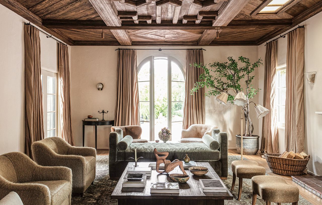 grand living room with daybed and indoor tree