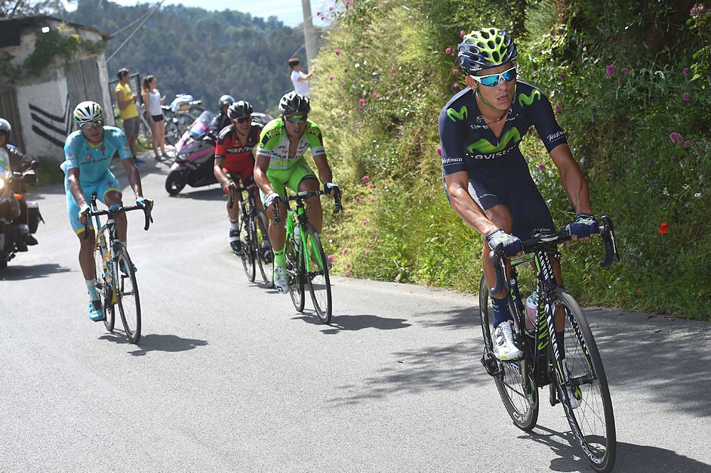 Movistar rider leads the small group on the climb