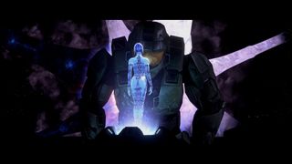 best Halo games: Master Chief looking at a small hologram of Cortana