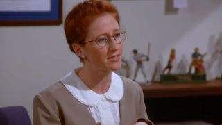 Vicki Lewis looking serious as Ada in Seinfeld