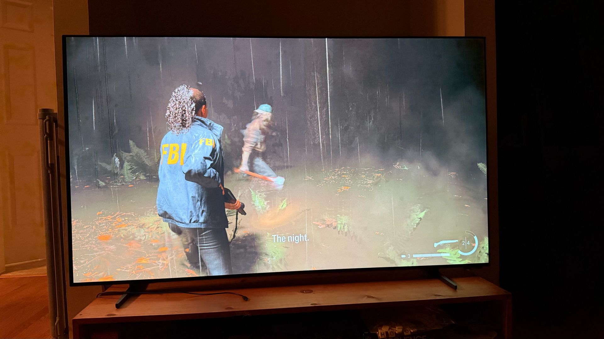 Roku Pro Series OLED showcasing its gaming prowess with Alan Wake II.