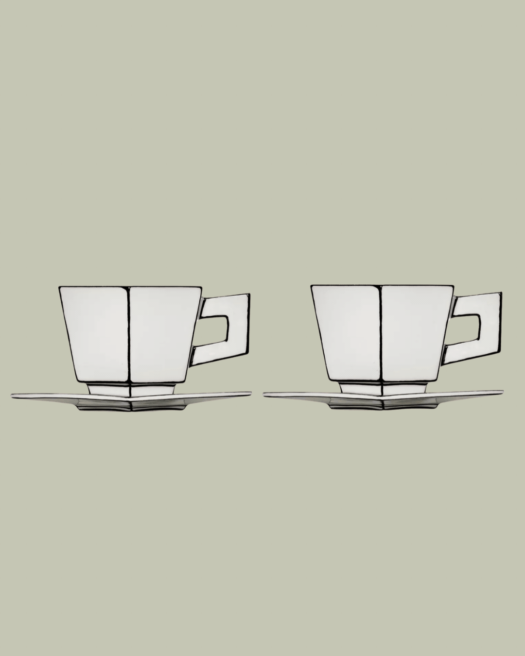 Annebet Philips Carte Blanche Porcelain Cappuccino Cup and Saucer Set of Two, shown in a rotating gif as two products against pale green background and topped by a biscuit, next to a teapot.