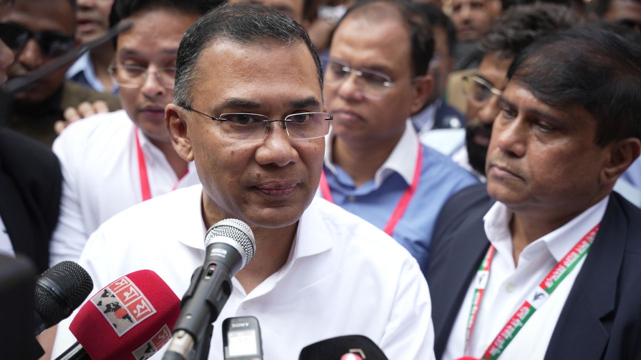 Bangladesh's BNP leader Tarique Rahman speaks to the media after casting his vote 