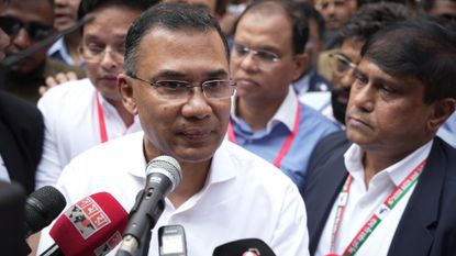 Bangladesh's BNP leader Tarique Rahman speaks to the media after casting his vote