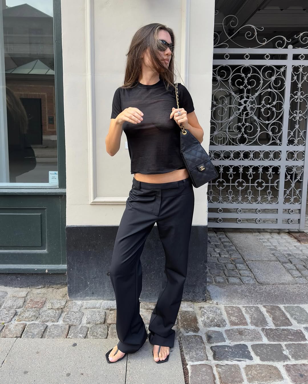 Ilirida in low-rise trousers and T-shirt