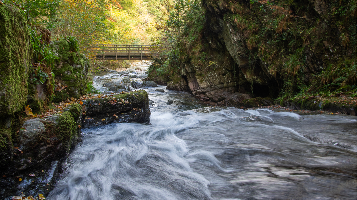 water running under a bridge