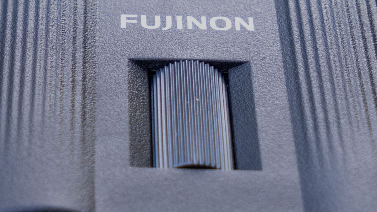 A close-up of the focusing wheel on the Fujifilm Techno-Stabi TS-L 1640 image-stabilized binoculars.