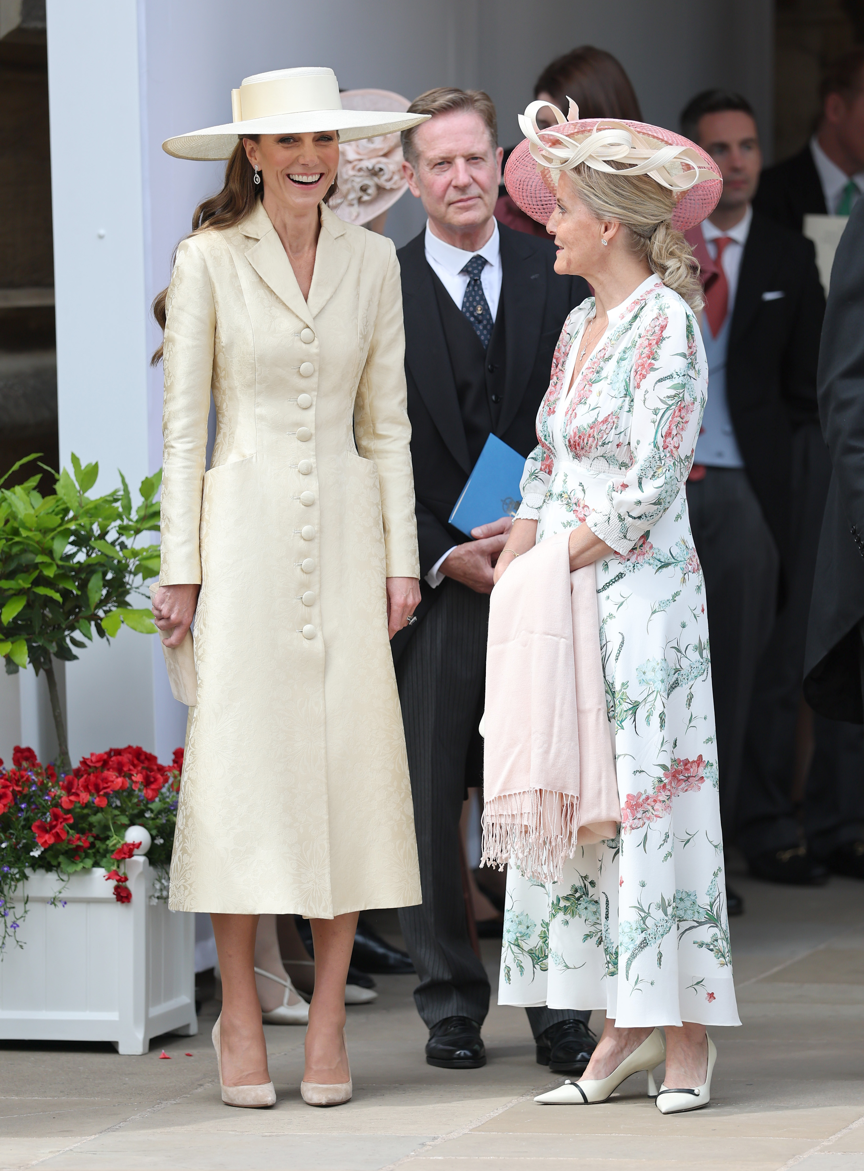 Princess Kate wearing the butter yellow trend for Garter Day 2026, with a brocade coat dress and matching wide-brim hat