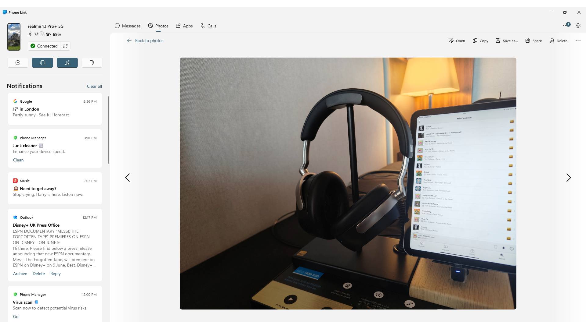 A screenshot of Phone Link on Windows, showing a photo of some headphones.