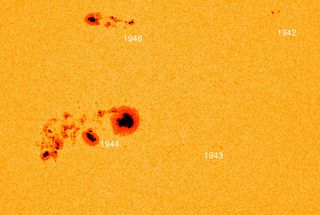 This labeled image taken by SDO's Helioseismic and Magnetic Imager shows the location of two active regions on the sun, labeled AR1944 and AR1943, which straddle a giant sunspot complex. A Jan. 7, 2014, X1.2-class flare emanated from an area closer to AR1943.