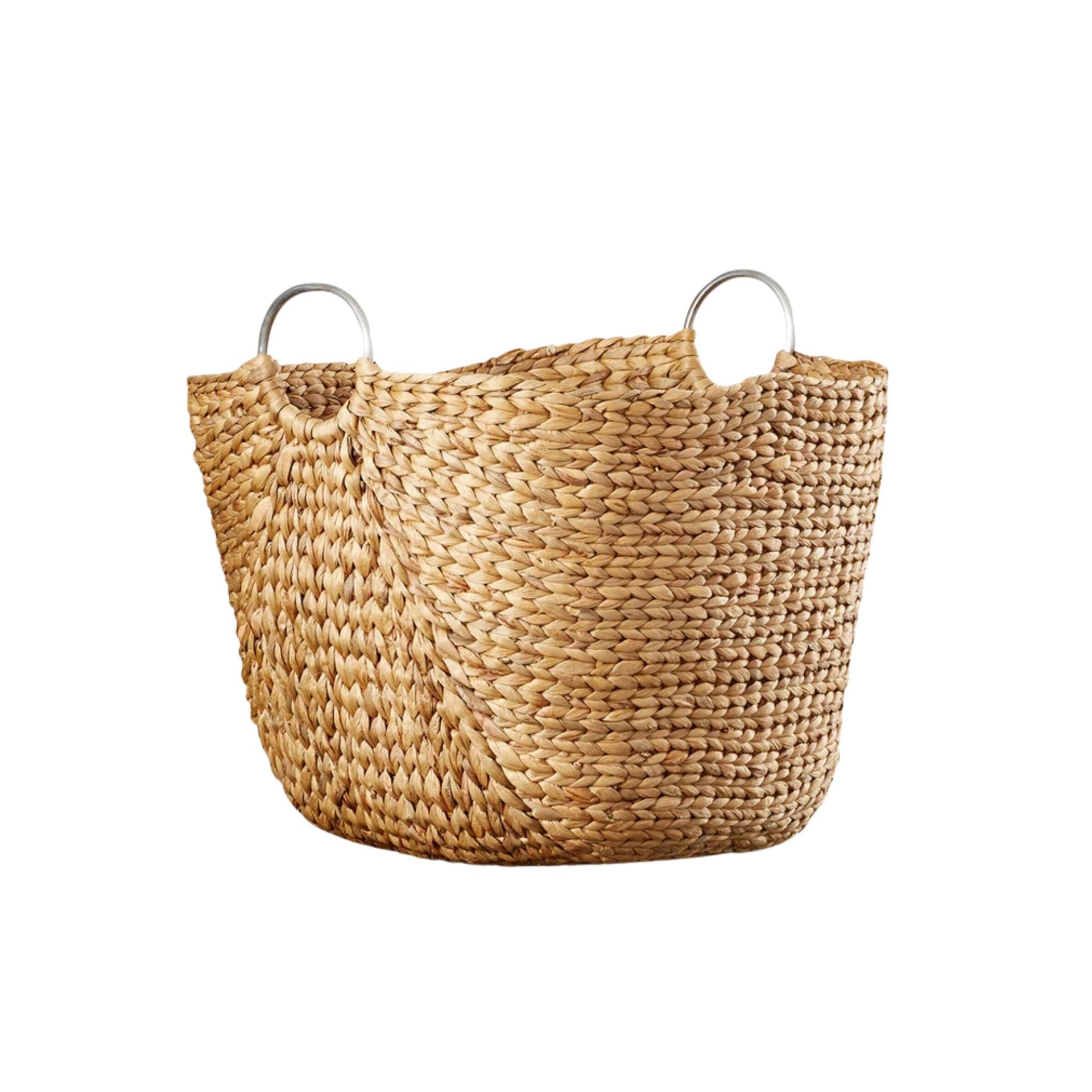 A light brown woven seagrass storage basket