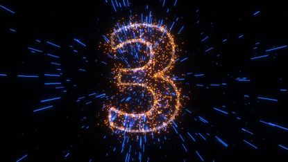 The number three looks like it's bursting against a black background.