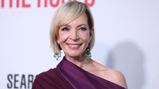 Allison Janney at premiere for The Roses in berry dress