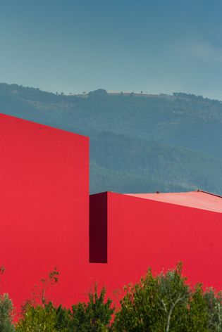 in Miranda do Corvo Future Architecture Thinking designs the flame-red House of the Arts